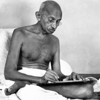 Mohandas Gandhi writing